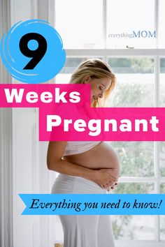 a pregnant woman standing in front of a window with the words 9 weeks pregnant everything you need to know