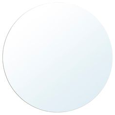 a round mirror on a white background