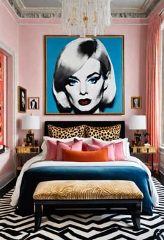 a bedroom with pink walls, black and white cheetah print on the bed