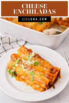 a white plate topped with lasagna covered in cheese