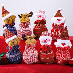 These Christmas gift doll bags feature a knitted design and come in a reusable 3D style, perfect for holding candy gifts or apple treats, these red drawstring bags serve as charming Santa sacks, stockings, and festive party favor supplies. COEN Set Size: Set of 8 | COEN Knitted Christmas Gift Doll Bags - Reusable 3D Drawstring Candy Gift Bags, Red Doll Apple Bags | Set of 8 | Wayfair Fabric Gifts For Christmas, Christmas Fruit, Xmas Sale, Christmas Packaging, Christmas Dolls, Christmas Gift Bags, Traditional Christmas, Childrens Gifts, Candy Bags