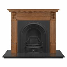 a fireplace with a wooden mantle and black hearth