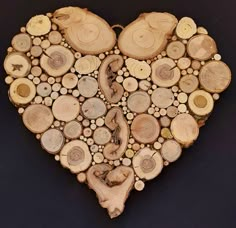 a heart shaped piece of wood that has been cut into smaller pieces