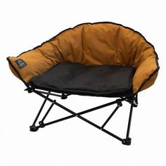 a dog bed that is sitting on top of a black and brown chair with wheels