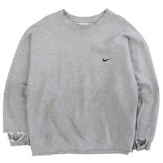 Vintage Nike Crewneck Sweatshirt Size 2XL Gray Embroidered Swoosh 90s Condition/Description Satisfactory condition.  Photos will highlight any imperfections on the item. Please refer to the photos to see the specific condition of the item.  Measurements: Pit to pit - 27" Length - 30" Collar to cuff - 32" Due to the nature of vintage clothing, size in title may not accurately represent the measurement of the item. Please refer to the measurements above to ensure the right fit. CONDITION LEGEND Excellent - Free of marks, stains, holes, or loose stitching. Great - Minor cracking or pilling; items may have minor marks or stains (free of fraying, loose stitching, and holes/rips). Good - May have minor marks/stains, minor yellowing, small holes, loose stitching, or fraying. Satisfactory - May ha Nike Vintage Sweatshirt Creme, Crew Neck Nike Vintage, Nike Sweatshirt Gray, Grey Nike Sweatshirt Vintage, Nike Crew Neck Vintage, Nike Crewneck Sweatshirt, Nike Crewneck, Mens Hoodies, Nike Vintage