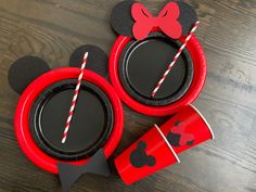 mickey mouse plates and cups with straws