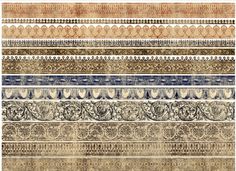 an old paper with different patterns and colors on the bottom, including blue, brown, beige