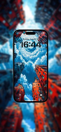 a cell phone with an image of buildings in the sky