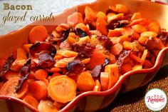 bacon and glazed carrots in a red dish on a table with the title above it