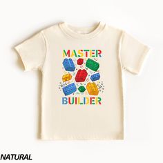 "Master Builder Colorful Toy Bricks T-Shirt - TODDLER Bella Canvas 3001T * Processing time is approx 1-7 business days (there may be exceptions during holiday seasons). Delivery time is based on your shipping type selection and location. Please check the estimated delivery times at checkout and upgrade the shipping at checkout if you need it sooner. * All items are made-to-order. Because of the nature of these items, unless they arrive damaged or defective, we cannot accept return or exchange. * Please review the all size charts displayed in the product images.  * Please note that the sizing chart includes the measurements of one side of the shirt, not the circumference.  * Sizing might differ 1\" (+-) from brand to brand. We recommend you to size up of you're between two sizes. * We're wo Kids Building Blocks, Lego Shirts, Boy Birthday Shirt, Kids Birthday Shirt, Kids Building, Kids Wear Boys, Lego Building Blocks, Kids Birthday Shirts, Birthday Boy Shirts