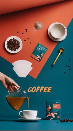 a person pouring coffee into a cup on top of a table