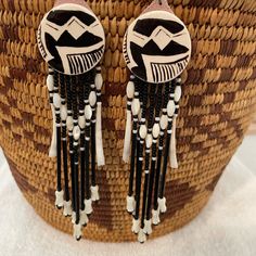 Beautiful Vintage Native American Navajo Made Earrings. All Handmade. Total Length Is 5” With The Pottery Measuring 1 1/4”. Vintage 1979. In Excellent Condition. Check Out My Other Navajo Jewelry. Southwestern White Dangle Jewelry, Southwestern Style White Dangle Jewelry, Southwestern Style White Jewelry With Dangling Beads, Southwestern Style White Earrings For Festivals, Southwestern Style Handwoven Dangle Jewelry, Handmade Southwestern White Earrings, Black Bohemian Hand-tooled Jewelry, White Southwestern Handwoven Jewelry, Black Hand-tooled Bohemian Jewelry