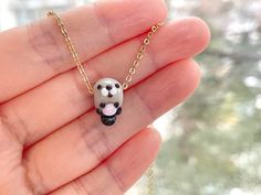 This sea otter necklace is cute and dainty, which is a perfect gift for kids and friends.  It is made of the following: 🔹 Size: H13 x W8 x D10mm (0.5-1mm variance)  These glass beads are handcrafted by a talented Japanese lampworker.  Each bead is unique so there is a slightly different from bead to bead. 🔹 Necklace Chain: gold / silver plated over brass 🔹 Necklace Length: choose the exact length of the chain (the length includes clasp and findings).   Please leave me a note to request an ext Whimsical Round Beads Necklace As A Gift, Kawaii Round Beads Jewelry Gift, Otter Jewelry, Otter Necklace, Animal Necklace, Sea Animal, Sea Otter, Handmade Glass Beads, Brass Necklace