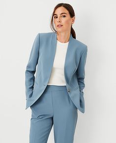 Our cutaway blazer works 24/7 - anywhere you wear it. V-neck. Long button-open sleeves allow for versatility in styling. One button front. Front besom pockets. Back vent. Lined.,Hit:Hits at hip,Imported:Imported,Fit:Tailored fit,Length:27" long,Fabrication:Shell: 95% Polyester, 5% Spandex; Lining: 100% Polyester,Garment Care:Machine Washable The Long Cutaway Blazer in Fluid Crepe by Ann Taylor Size regular - 0 Blue Echo Women's Regular, Blazers, Long, Sleeve, Suit, Jackets, Jackets, Shell 95%, P Blue Suit Women, Blazer 2024, Working Outfit, Air Style, Earth Style, Long Sleeve Suit, Earth Energy, Open Sleeves, Suit Jackets For Women