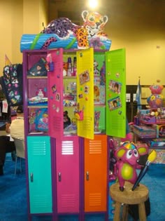 colorful lockers are stacked on top of each other in a room filled with toys