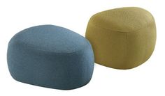 two different colored poufles sitting next to each other on a white background, one is yellow and the other is blue