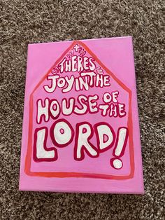 a painting on the ground that says, there's joy in the house of the lord