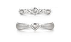 two wedding rings with diamonds on top and bottom, one is white gold the other is silver