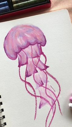 a drawing of a pink jellyfish