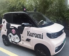 a car that has been painted to look like an anime character