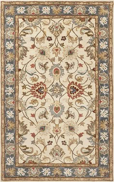 a white rug with blue, red and yellow flowers on the bottom half of it