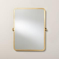 a gold framed mirror on the wall with no one in it or someone out there