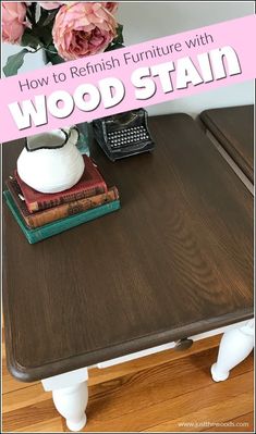 a wooden table with flowers on top and a typewriter next to it that says how to refinish furniture with wood stain