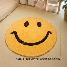 a yellow smiley face rug on the floor