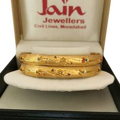 "Please contact us for any discounts or offers that are available on this item. As these gold bangles are very light in weight, after making these bangles, we put a protective metal bangle on the inner surface of the original gold bangles, as shown in the 4th image, this provides strength & shape to the bangles. Please Note:- The bangles are made out of Real Solid Gold & the metal bangles are just for support & durability. All Sizes available. We take absolute care of precious jewels Plain Gold Bangles, 22k Gold Bangles, Metal Bangles, Bridal Jewelry Sets Brides, Gold Bracelet Simple, Indian Bangles, New Gold Jewellery Designs, Gold Bangle Set, Beautiful Gold Necklaces