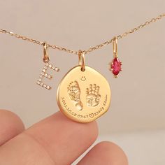 💞The Baby Handprint and Footprint Necklace is a precious keepsake, meticulously crafted in 10K/14K/18K solid gold and PT950 to capture a lifetime of memories. Available in size：15*15mm. Each piece embodies the cherished bond between parent and child. ❣Side stones: Upgradeable to diamond for a fee of $349. or upgrade to natural gemstone for a fee of $119.   Customizable with engravings on both sides, this necklace offers a truly personal touch. Whether it's your baby's actual footprints or handprints, significant dates, or names, you can personalize it to commemorate your most treasured moments. Ideal for new parents or as a heartfelt gift for loved ones, this necklace is a timeless treasure that will be cherished for years to come. Capture the essence of love and joy with this exquisite p Footprint Necklace, Gift For Newborn, Baby Handprint, Baby Necklace, Baby Jewelry, Gold Baby, Handmade Jewelry Gift, Keepsake Jewelry, Baby Keepsake