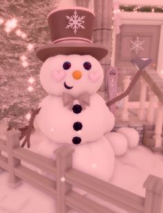 a snowman with a top hat and bow tie standing in front of a fence