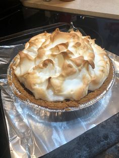 a pie sitting on top of a metal pan