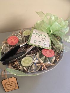 a glass bowl filled with lots of different items