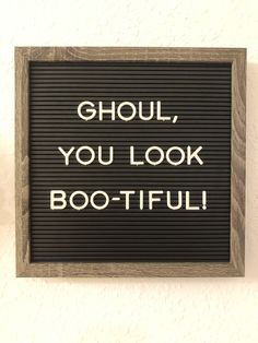 a sign that says ghoul, you look boo - tiful