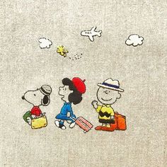 the peanuts gang is walking together with their luggage