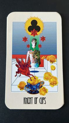 a playing card with the queen of cups on it