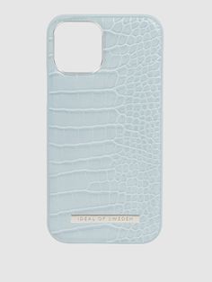 the case is made from light blue crocodile leather