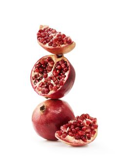 two pomegranates stacked on top of each other