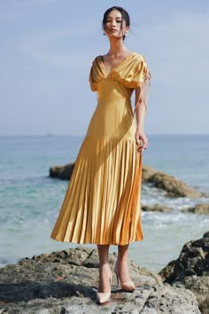 Maria Pleated Silk Dress – VAST Empire Waist Wedding Guest Dress, V-neck Dress With Ruched Bodice For Brunch, Silk V-neck Dress With Gathered Sleeves, Silk Pleated V-neck Maxi Dress, Summer Pre-draped Midi Dress With Fitted Bodice, Elegant Pleated V-neck Dress With Short Sleeves, Pleated V-neck Dress With Fitted Bodice, V-neck Midi Dress With Ruched Bodice For Brunch, Fitted V-neck Pleated Dress With Pleated Sleeves