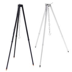 two black and white tripod stands with chains on them