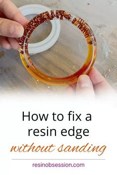 a person holding a ring with the words how to fix a resin edge without sanding