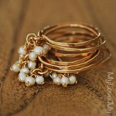 a stack of rings sitting on top of a wooden table