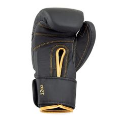 a black and gold boxing glove on a white background