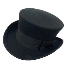 Edwardian top hat. You can make your hat with your favorite color by choosing it from my Wool felt color card. Made with short crown and embellished with a 50 millimeters wide grosgrain ribbon. Edwardian top hat ideal for everyday and special ocasions such as weddings, cocktails or parties. For man and woman.Measurements in centimeters are 32 x 27. Crown height 11. Brim length 6. These measurements may have some slight variation depending on the size of the hat.The end of the brim is reinforced Classic Winter Costume Hats And Headpieces, Vintage Solid Color Felt Hat With Flat Brim, Vintage Solid Flat Brim Felt Hat, Retro Top Hat With Curved Brim For Winter, Classic Fitted Winter Costume Hats And Headpieces, Vintage Top Hat With Flat Brim, Retro Curved Brim Top Hat For Winter, Classic Brimmed Mini Hats For Winter, Classic Short Brim Costume Hat For Winter