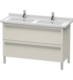 two white sinks sitting next to each other