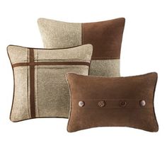 three brown and beige pillows with buttons on them