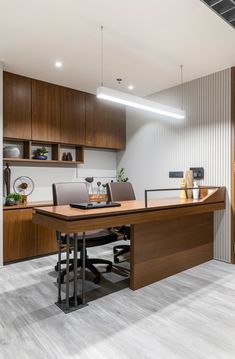 an office with wooden desks and chairs