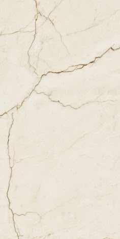 a white marble textured surface with cracks and cracks in the top right hand corner