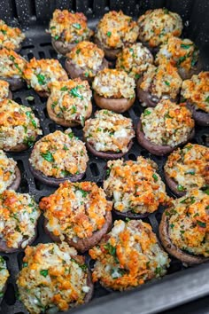 baked stuffed mushrooms with parmesan cheese and chives in a grilling pan