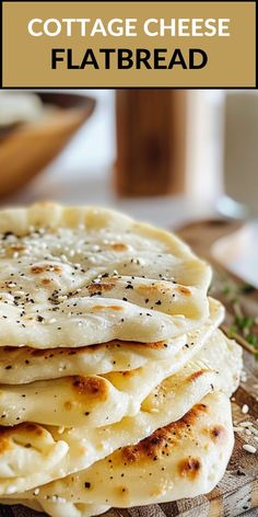 homemade cottage cheese flatbreads on a wooden cutting board with text overlay that reads cottage cheese flatbread